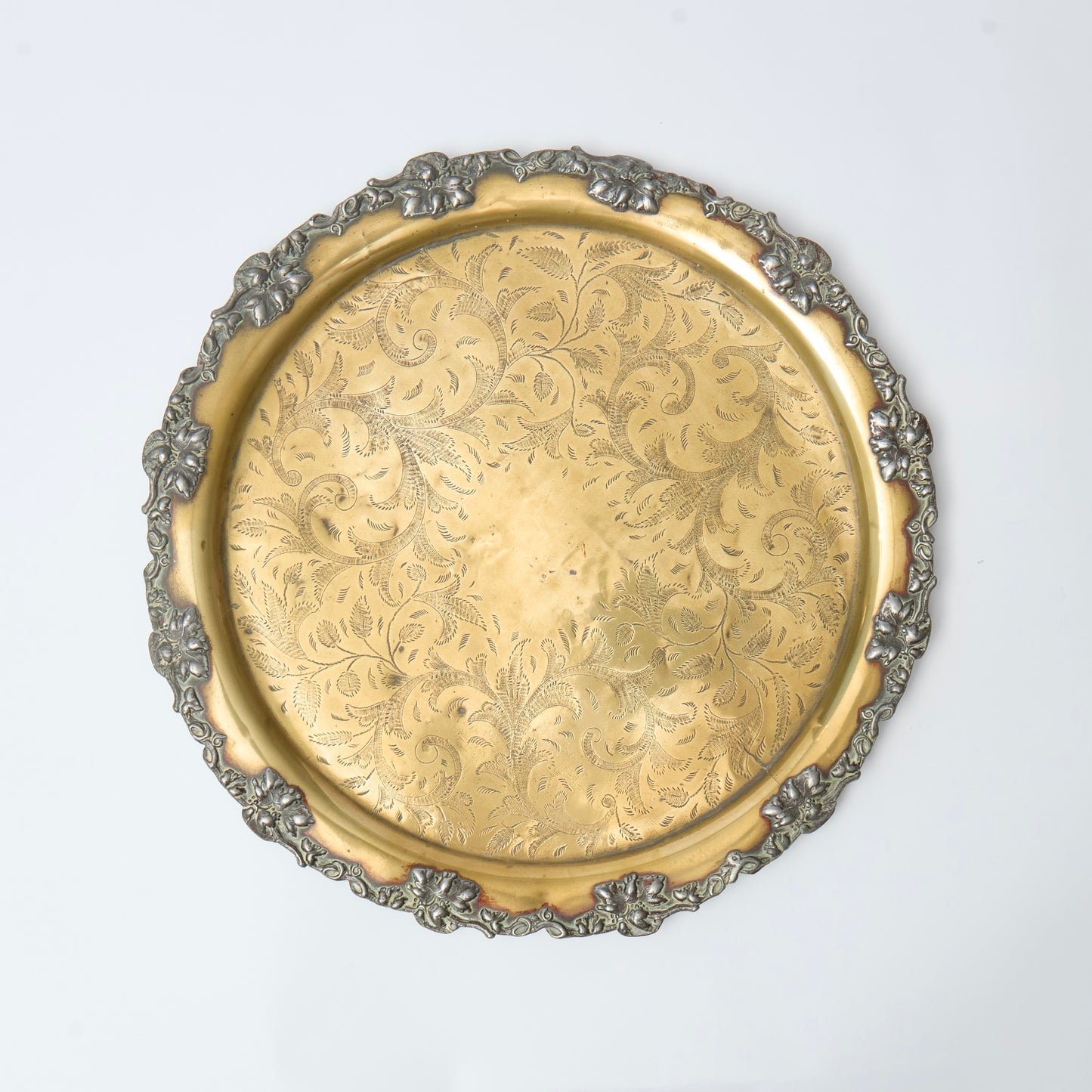 Brass Tray decorated with silvered foliate edge