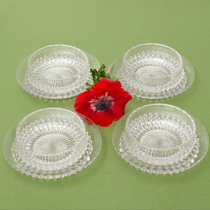 Set of 10 small cut glass dishes, with separate plates